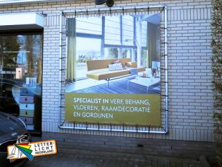 Muurframe spandoek als gevelreclame